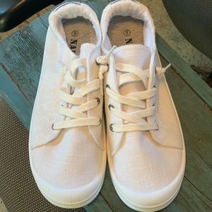 NWOT woman’s sneakers.